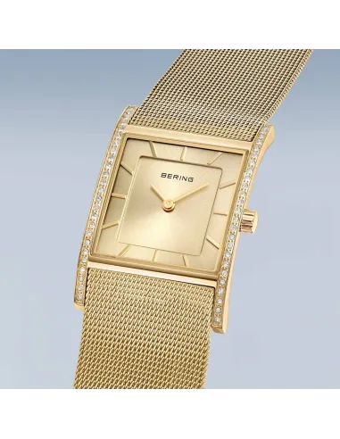 BERING Classic Ur – Poleret guld, rustfrit stål med keramiske links.