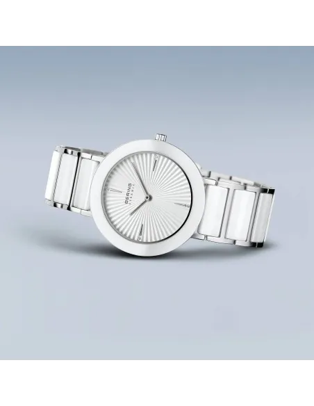 BERING Classic Ur – Poleret guld, rustfrit stål med keramiske links.