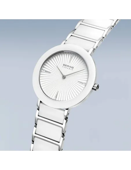 BERING Classic Ur – Poleret guld, rustfrit stål med keramiske links.